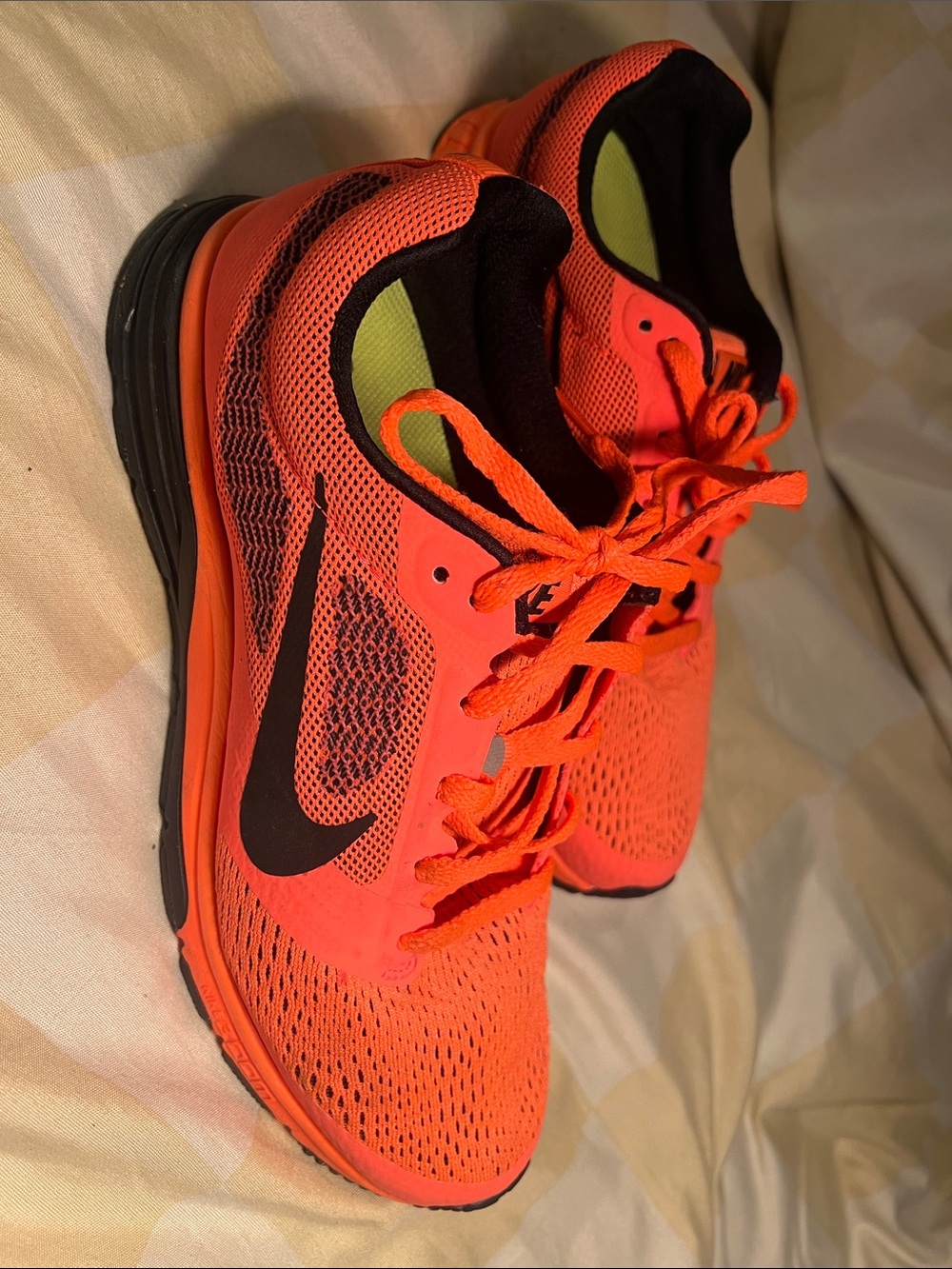 Nike Women’s Orange Mesh Sneakers with Black Swoosh